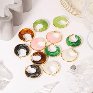 Colorful resin hoop earrings set with gold fasteners in various vibrant styles