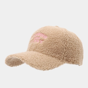 Detail of beige teddy fleece baseball cap with pink connected and busy embroidery