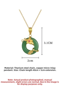 Detail of flower-shaped jade ring pendant in titanium steel with gold-tone chain