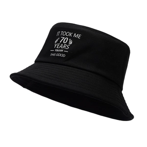 70th Birthday black cotton bucket hat with white slogan printed on a 45-degree angle view