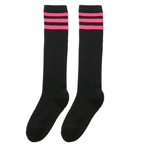 Detail of black cotton knee-high socks with three pink stripes in a flat lay view