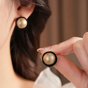 French vintage round pearl earrings with black velvet trim and champagne gold finish
