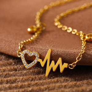 Golden stainless steel anklet with sparkling zircon heart and heartbeat line design