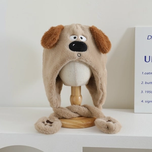 Detail of plush dog hat with soft faux fur texture and cute paw-shaped earflaps