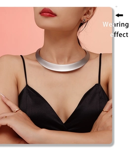 Detail showing wearing effect of wide brushed silver metal choker with elegant dress