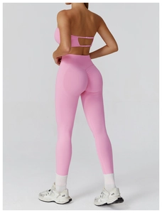 Rear view of pink yoga set showing scrunch butt leggings and open back sports bra details