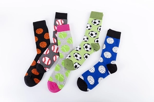 Detail view of cotton crew socks featuring jacquard basketball, soccer, and baseball patterns