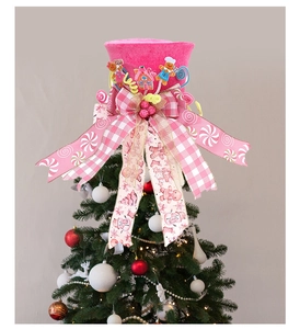 Pink velvet Christmas tree topper hat with gingerbread man and candy cane decorations