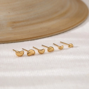 Lot de trois paires de boucles d'oreilles en acier inoxydable doré forme de grain