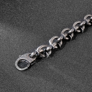 Vintage oxidized stainless steel nail bracelet for men with embossed texture and lobster clasp