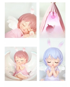 Detail view of macaron colored angel and rabbit night light made of resin material