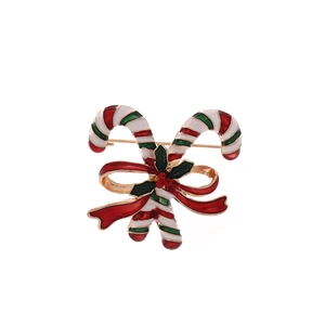 Creative Christmas candy cane brooch with red bow and holly leaves in gold plating