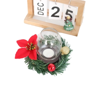 Poinsettia Christmas candle ring with golden glitter ornaments and lush pine needles