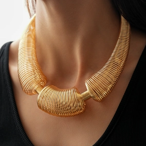 Exaggerated gold geometric spring coil necklace for women with thick metallic style