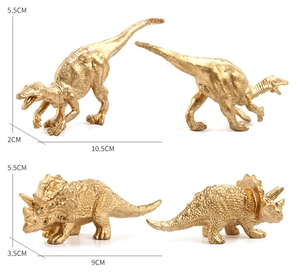 Detailed macro view of golden dinosaur models showing dimensions for iguanodon and triceratops