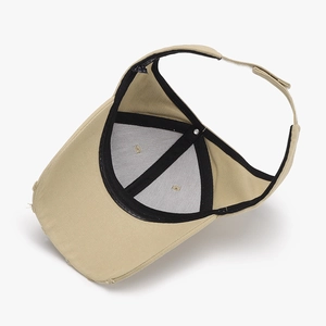 Beige ponytail baseball cap interior view showing sweatband and washed label detail