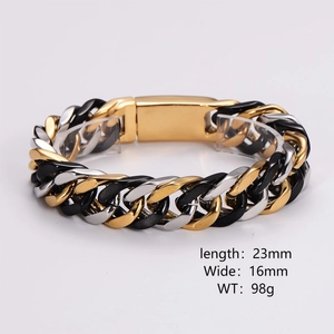 Close-up of tricolor punk curb chain bracelet with gold black and silver steel links
