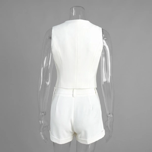 Rear view detail of white sleeveless vest and cuffed shorts in professional suit fabric