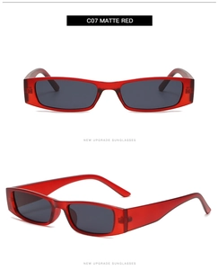 Detail view of vintage small square matte red sunglasses with dark grey lenses