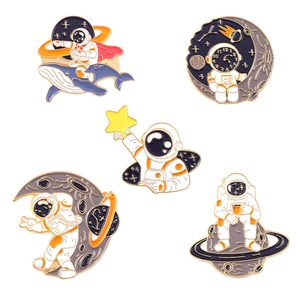 Set of five cute astronaut and whale themed enamel pins for space jewelry accessories