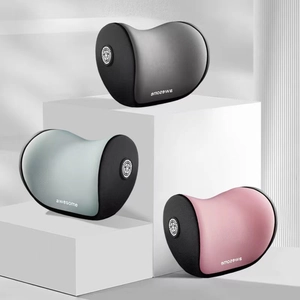 Ergonomic PU leather car neck pillows in black, blue, and pink on display stands