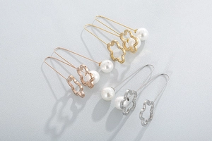 Detailed set of three clover earrings with rhinestones and pearls in gold, silver, and rose gold