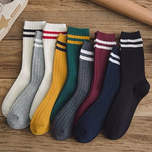 Retro ribbed cotton knee high socks in multiple colors with striped athletic cuffs