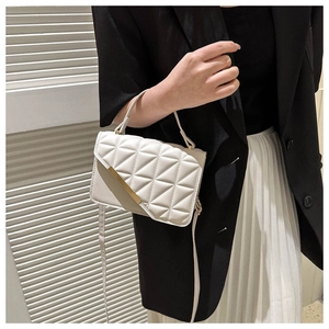 Chic white quilted crossbody bag with gold hardware and top handle for women