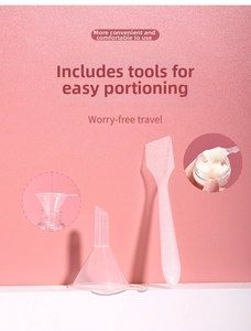 Travel toiletry set featuring a clear plastic funnel and pink cream spatula tool