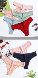 Detail of ribbed cotton thong with lace trim in vibrant red and soft pastel colors