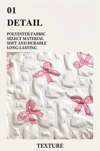 Close-up of quilted polyester fabric detail with pink bow print on white cosmetic bag