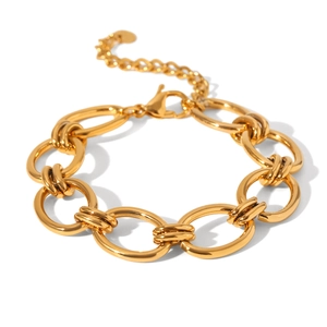 Close-up of 18k gold plated chunky chain bracelet with oval links and lobster clasp