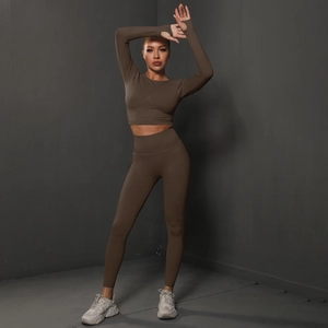 Detail of dark brown seamless yoga set featuring thumb holes and high waist leggings