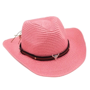 Detail of bright pink straw cowboy hat with leather band and metal bull head pendant