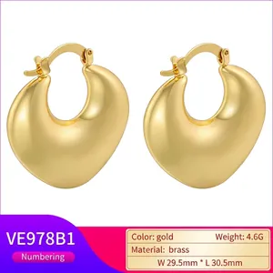 Polished gold plated brass puffy teardrop earrings with symmetric mirror finish surface