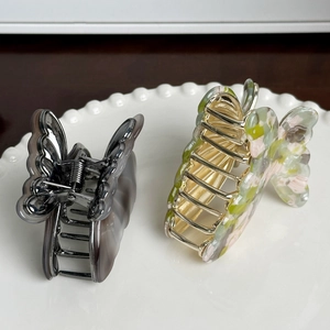 Elegant butterfly acetate hair claws in dark transparent grey and floral prints