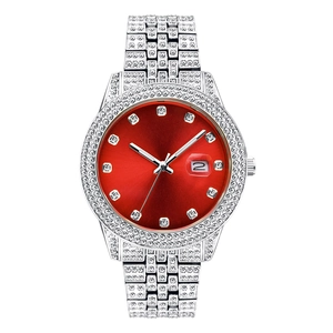 Detail of silver iced-out watch featuring a red dial with square crystal hour markers