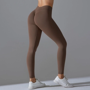 Detail showing high-waisted scrunch butt lifting design on seamless brown yoga pants