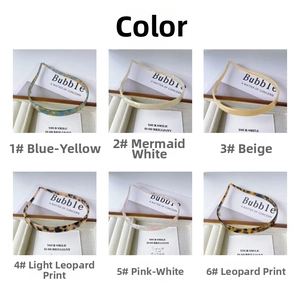 Selection of six patterned acetate headbands in floral and leopard print displayed on cards
