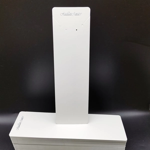 Vertical view of white fashion jewelry display cards for necklaces and earrings
