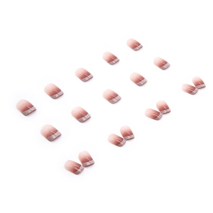 Press-on nails featuring elegant gradient pink base with classic white French tips