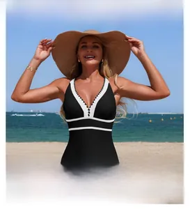 Detail of black one-piece swimsuit with white contrast trim and V-neckline button decor