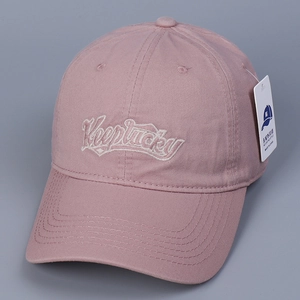 Detail of dusty pink baseball cap with white Keeplucky embroidery and original tag