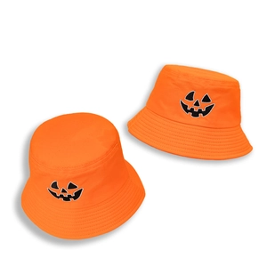 Orange Halloween bucket hat with pumpkin face embroidery on a clean white background