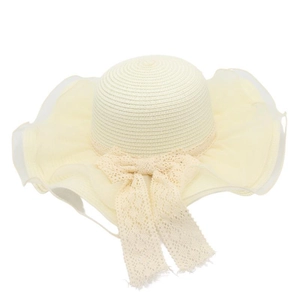 Detail of wide brim straw sun hat featuring wavy organza edge and lace bow ribbon