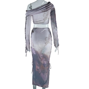 Detail of purple floral mesh two-piece set with long-sleeved top and drawstring skirt
