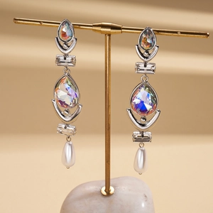 Silver geometric teardrop earrings with crystal rhinestones and white faux pearl pendants