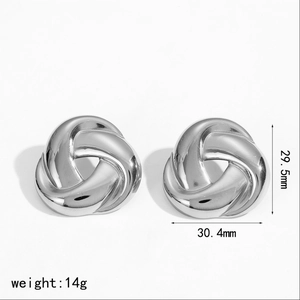 Detail view of large silver twist stud earrings showing 29.5mm height and 30.4mm width