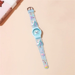 Macro detail of a colorful unicorn pattern on a blue silicone children's watch strap