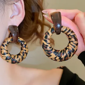 Statement leopard print resin hoop earrings with retro tortoiseshell geometric design